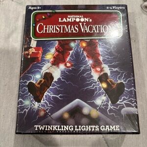Christmas Vacation Twinkling Lights Game - Festive Red and Black
